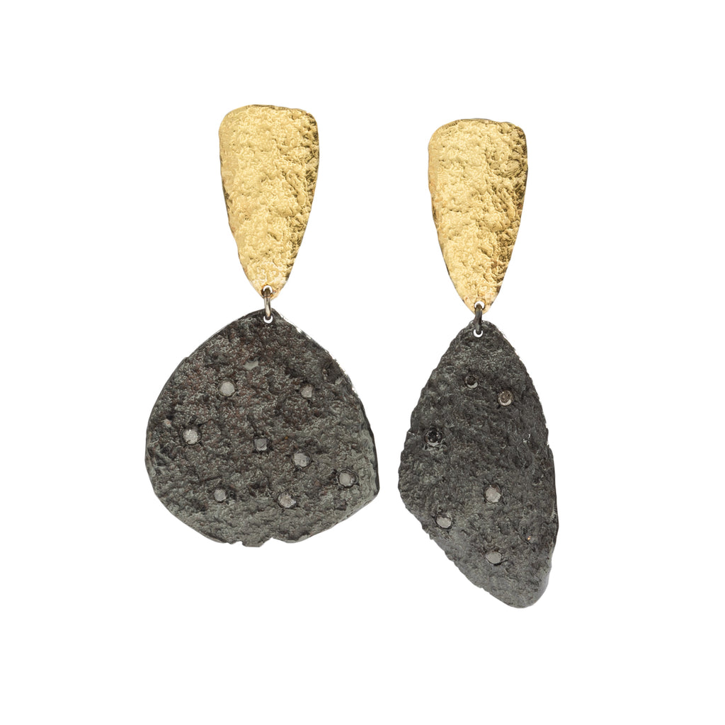 Good Vibes Black & Gold Earrings by Emanuela Duca - Earrings crafted with textured 18K yellow gold elements holding blackened sterling silver highly textured elegant forms, each adorned with captivating grey diamonds. This artistically designed pair is perfect for special occasions, embodying sophistication and elegance in every detail. Height: 2.4 inches.