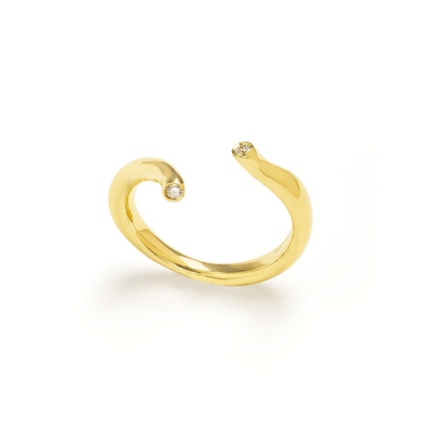 The InsideOut ring in 18k yellow gold offers a delicate and elegant appearance, featuring an open design on top of the finger, revealing two small diamonds. This lovely design adds a touch of sophistication and charm to any ensemble. • 18k yellow gold, diamonds ct: ct: 0.04