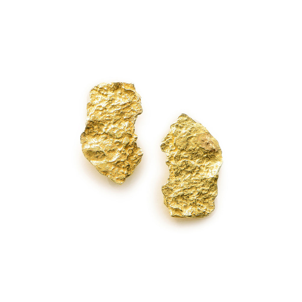 Roccia 18k Gold Earrings by Emanuela Duca. The ragged surface of 18k yellow gold exudes raw elegance, coupled with an earthy sophistication. It's a testament to the beauty found in the imperfection or perfection of natural forms. Posts.